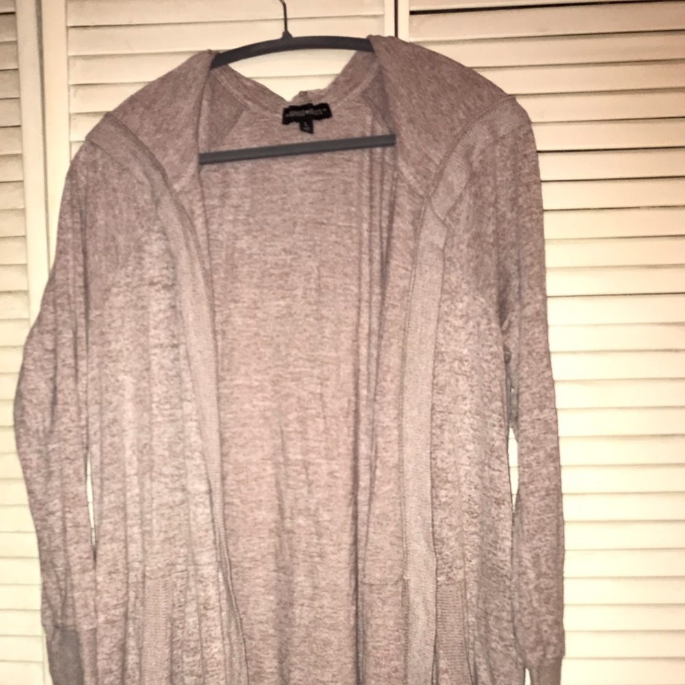 Long sweater with hoodie and pockets